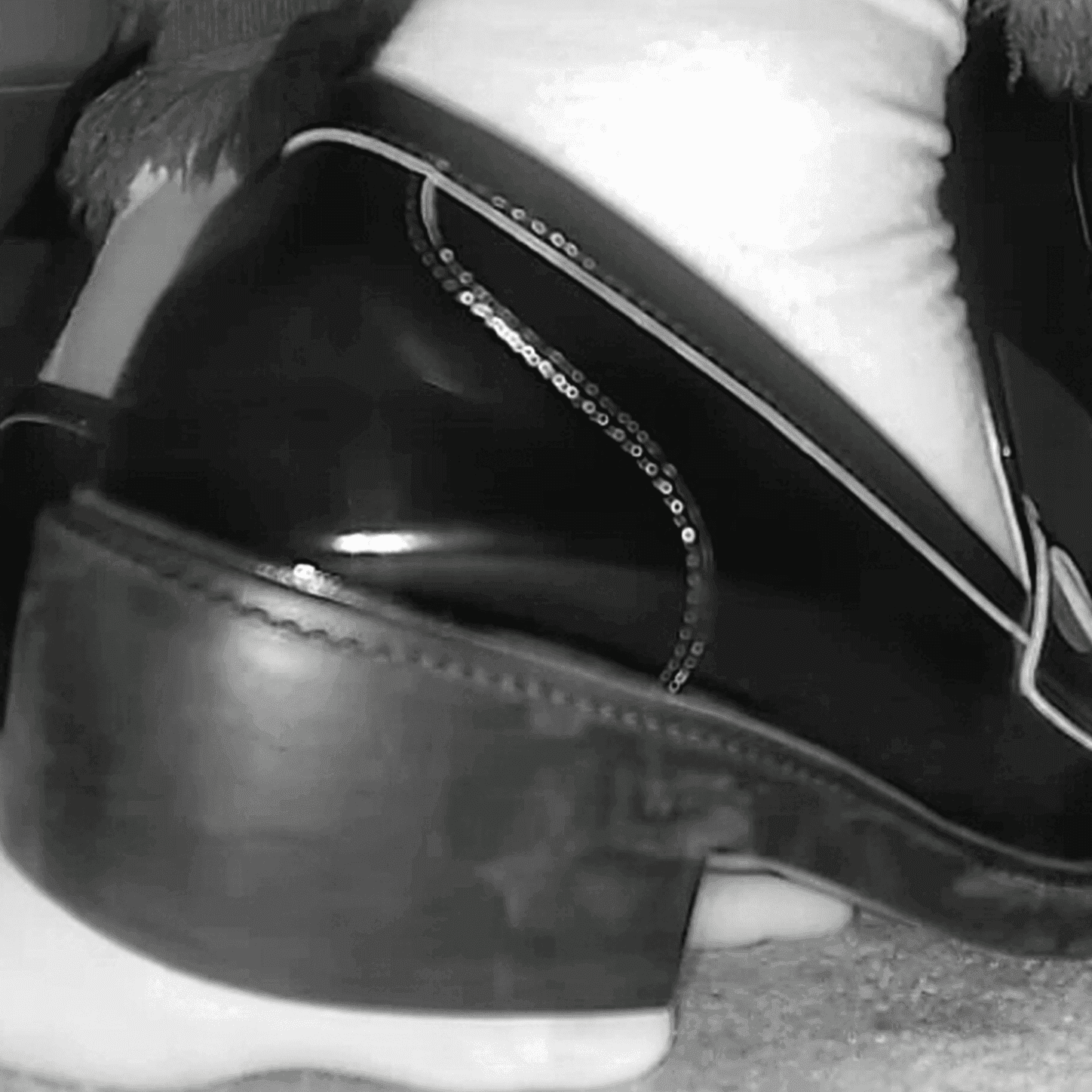 Cinema girl white socks and chunky-heeled leather shoes candid hand trample