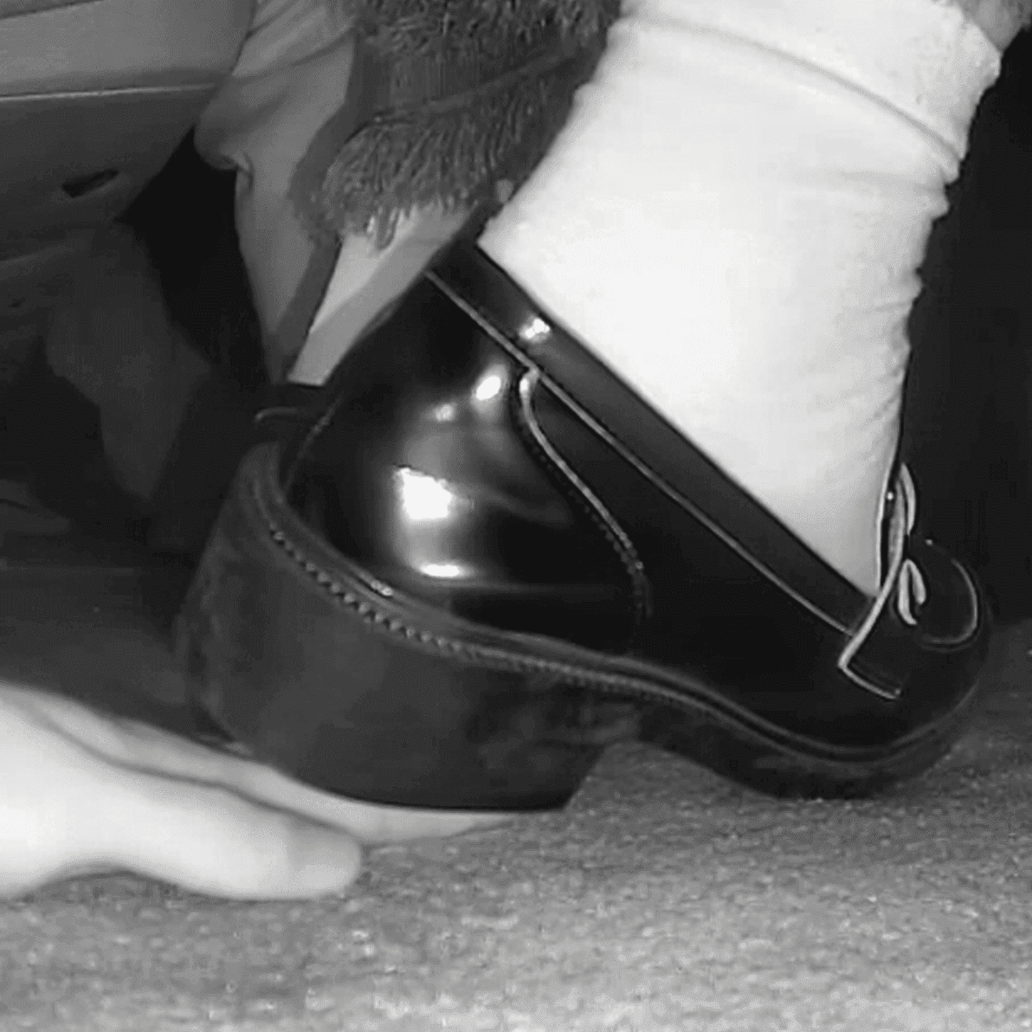 Cinema girl white socks and chunky-heeled leather shoes candid hand trample