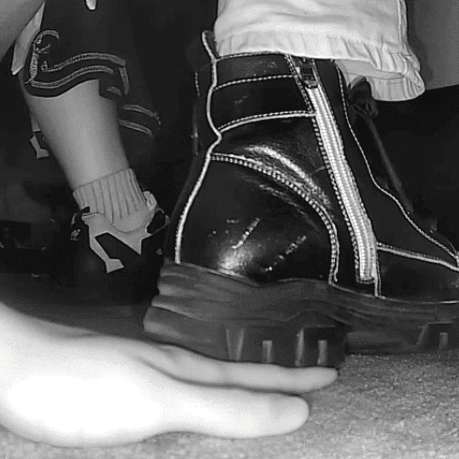 Cinema girl white socks and chunky-heeled leather shoes candid hand trample