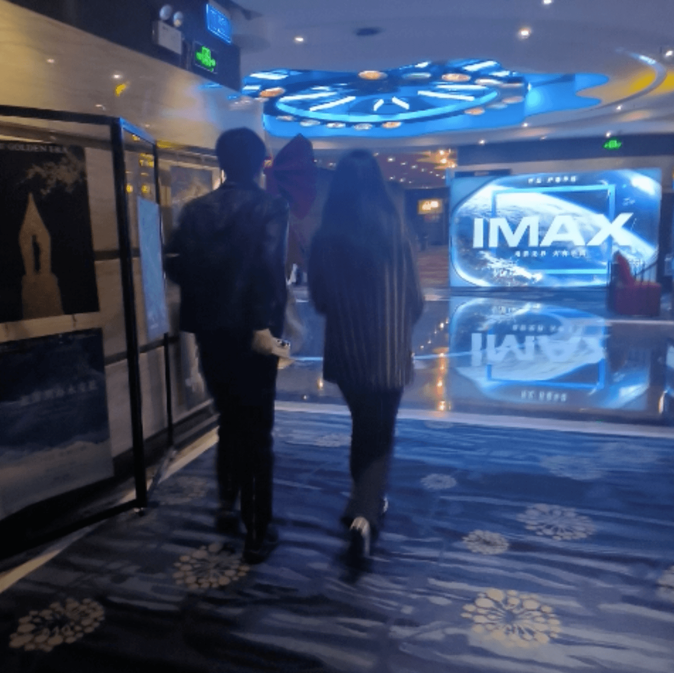 Three girls in a movie theater candid step on hand whit Converse shoes + shoe licking