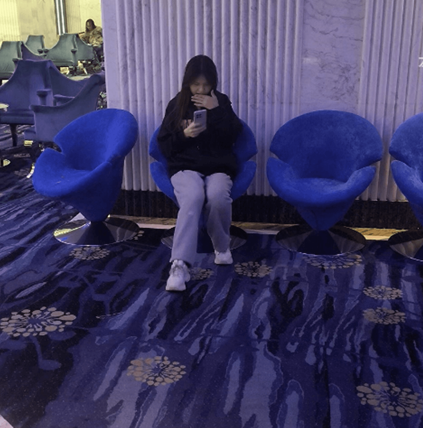 Girl candid crush in movie theater with MLB sneakers