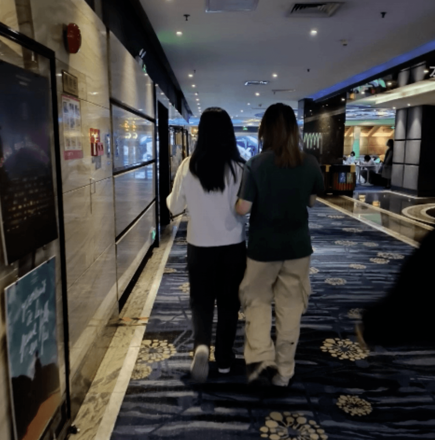Girl candid hand trample with white socks Puma skate shoes in cinema