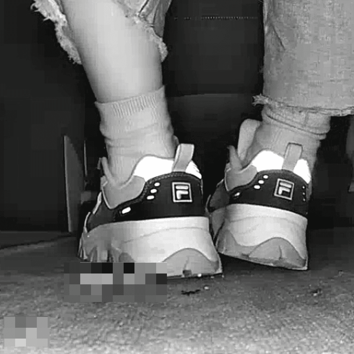 Beautiful woman wearing Fila sneaker candid crush in movie theater