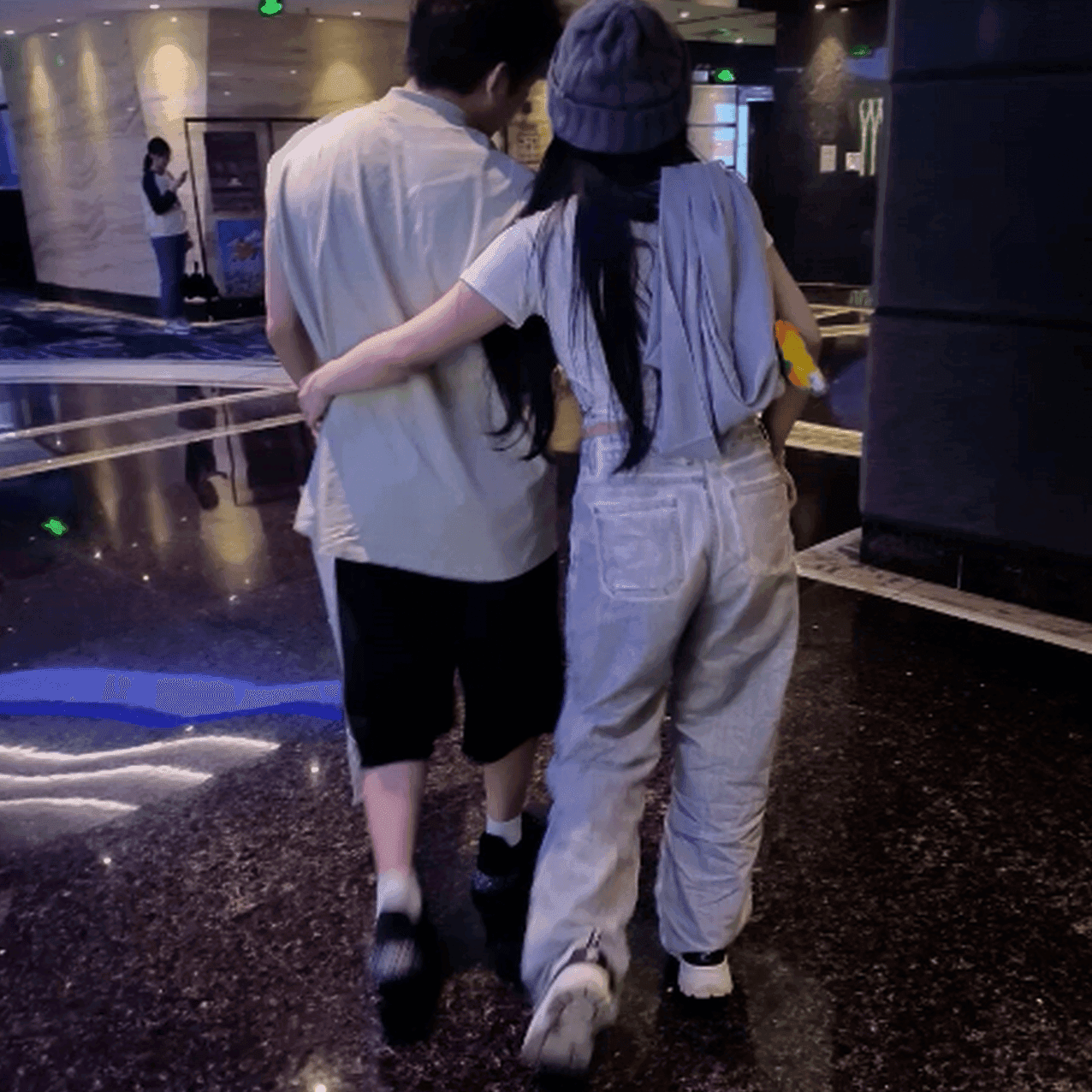 Beautiful woman wearing Fila sneaker candid crush in movie theater