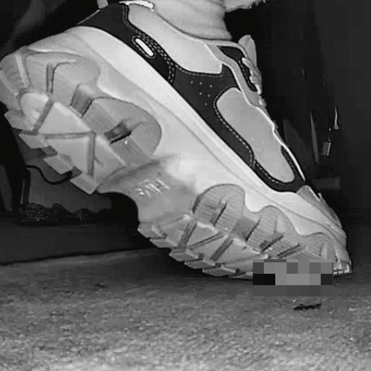 Beautiful woman wearing Fila sneaker candid crush in movie theater