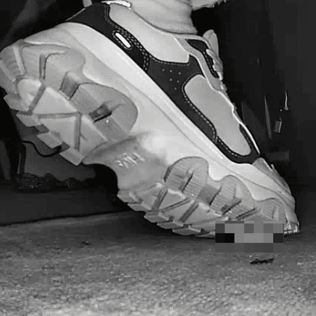 Beautiful woman wearing Fila sneaker candid crush in movie theater
