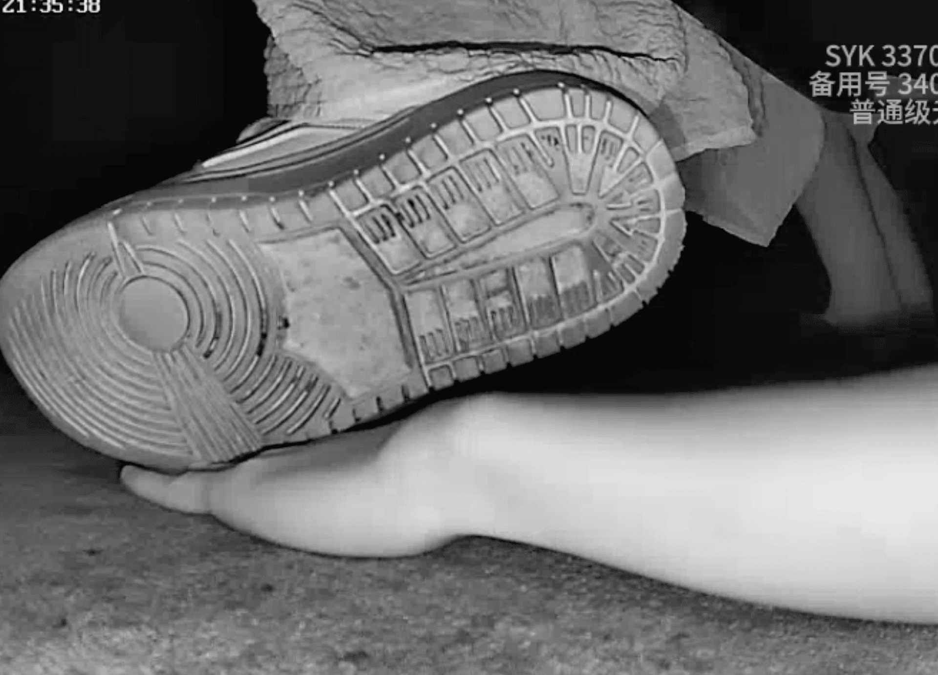 Two girls in the cinema with MLB sneakers and the white flat shoes candid trample on hand