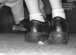 Girl wearing white socks and leather shoes with her boyfriend candid crush at the cinema