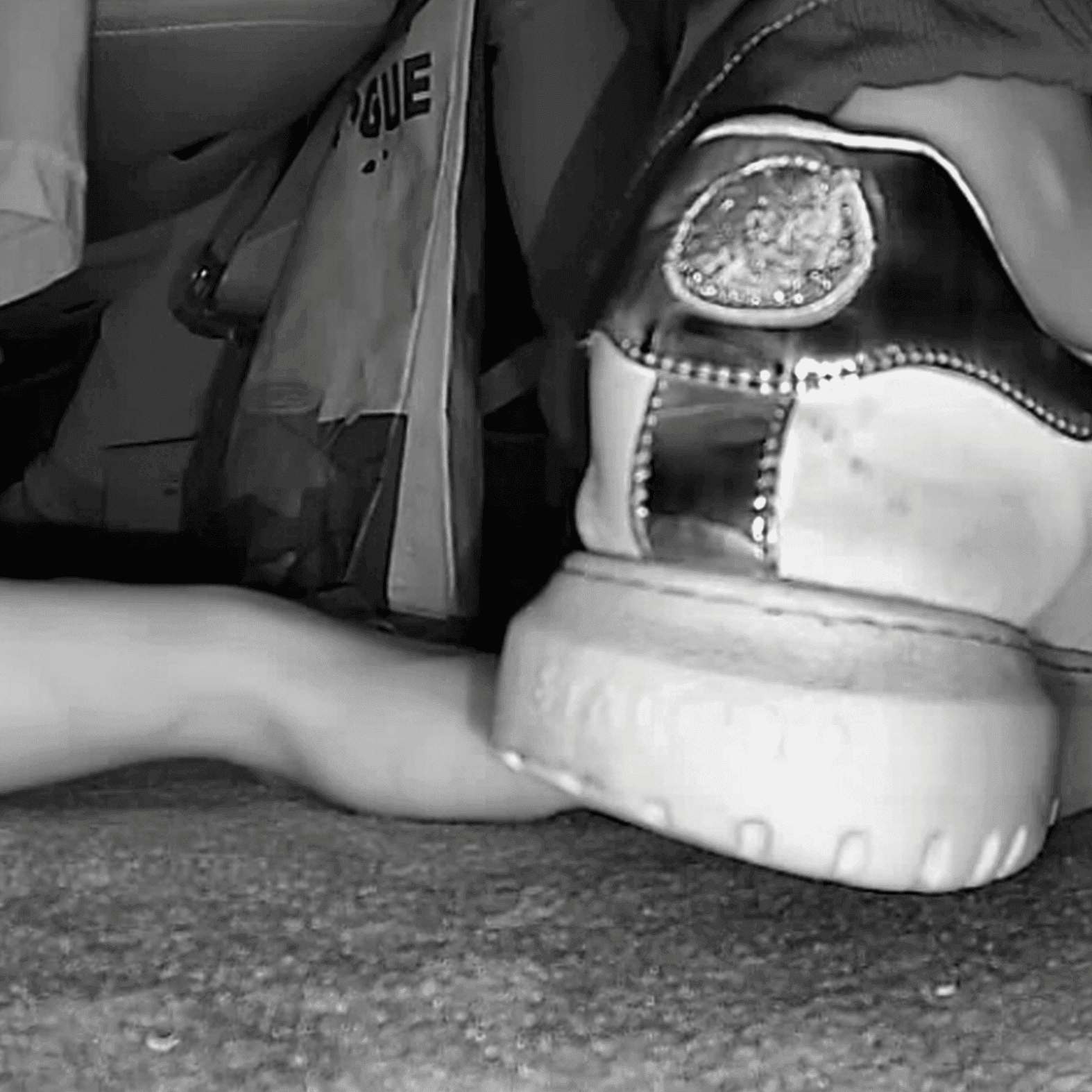 Girl in movie theater candid trample on hand with thick-soled sneakers