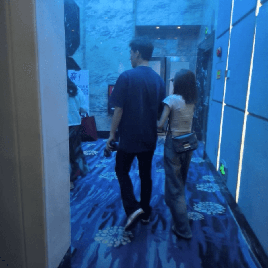 Woman in cinema candid hand trample with Converse and flat shoes