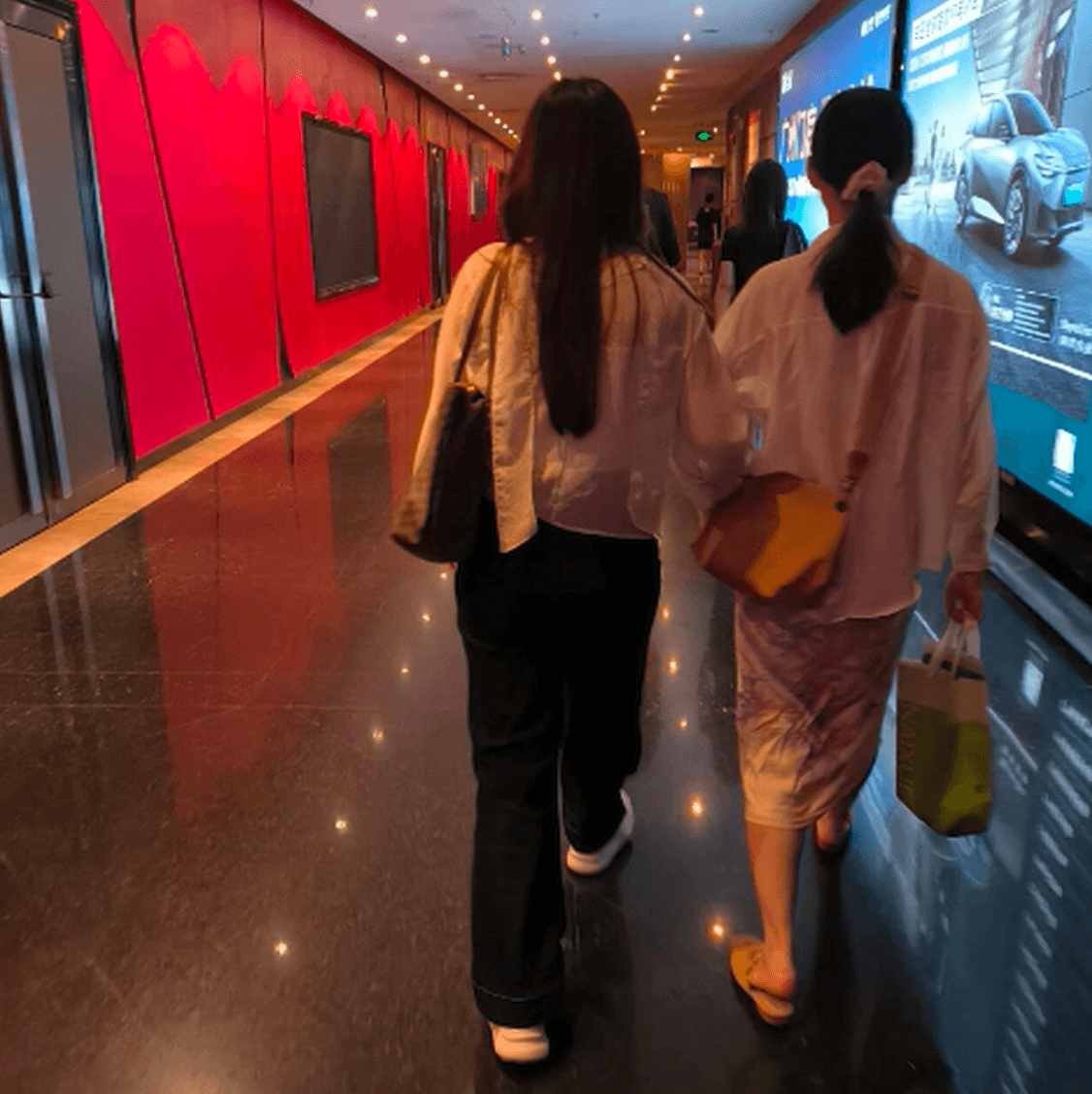 Cinema girl candid hand trample with stiletto heels + white sneakers