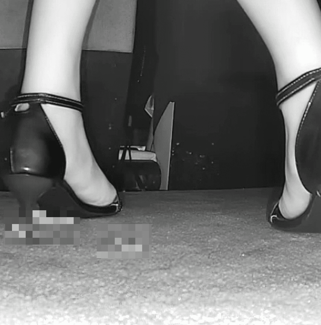 Beautiful woman in cinema candid crush with black high heels