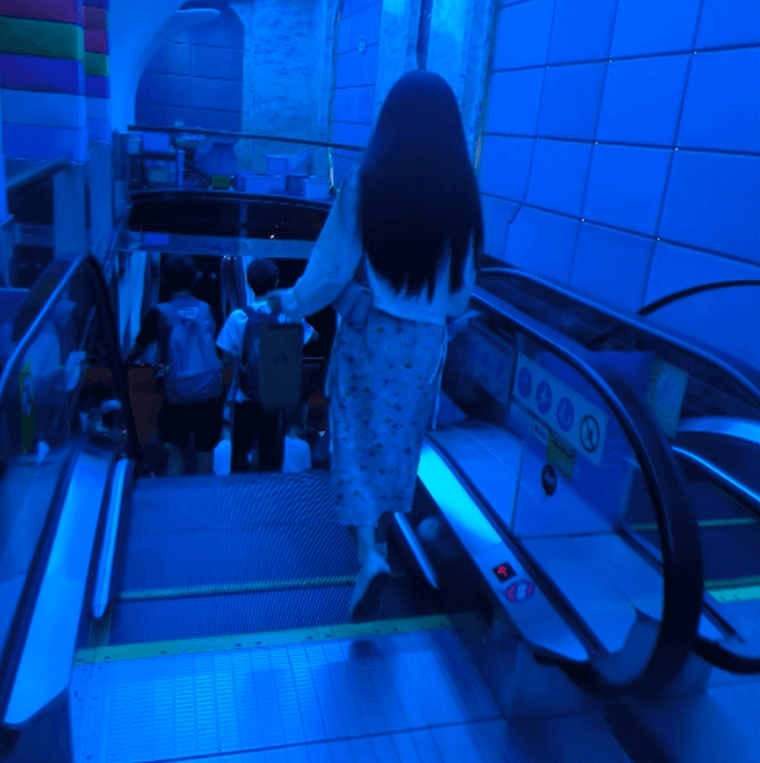 Girl in cinema candid crush with long skirt and Vans shoes