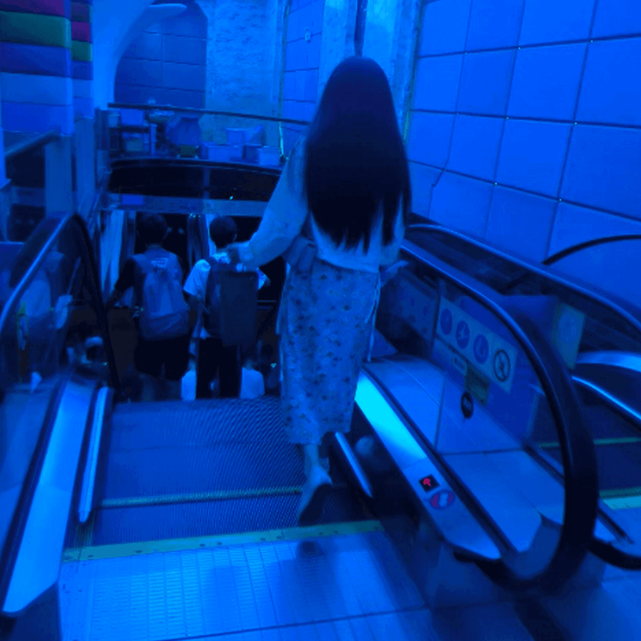 Girl in cinema candid crush with long skirt and Vans shoes