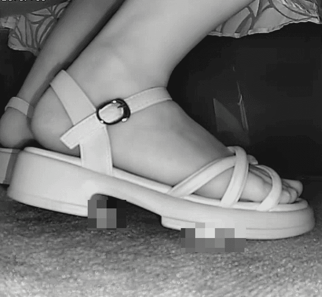 Women in movie theater candid crush with white sandals