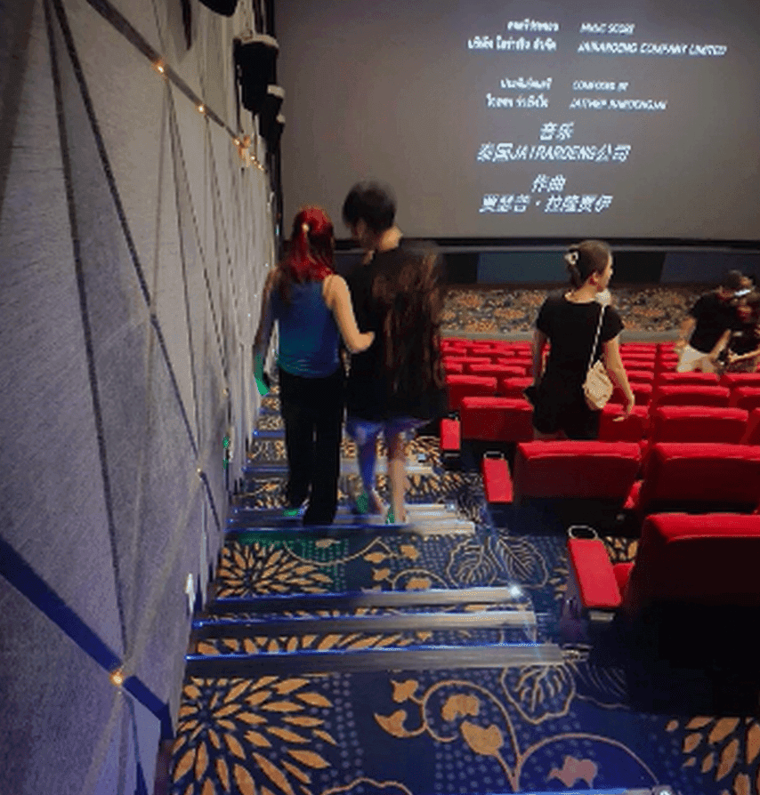 Girl in Alexander McQueen sneakers candid crush at the cinema
