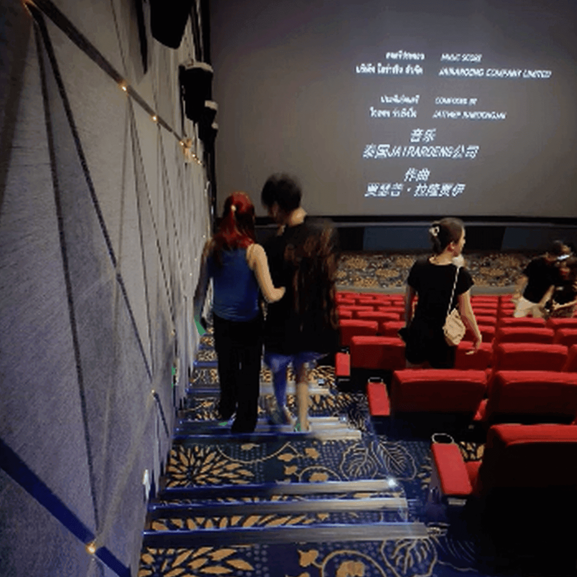 Girl in Alexander McQueen sneakers candid crush at the cinema