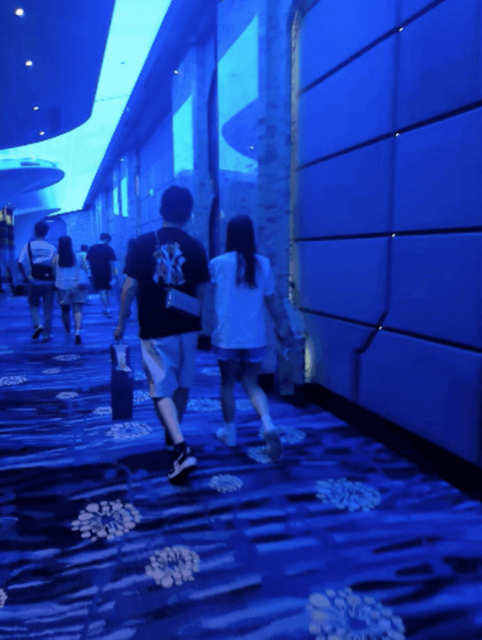 Woman candid crush with white socks and Nike Air Force 1 in cinema