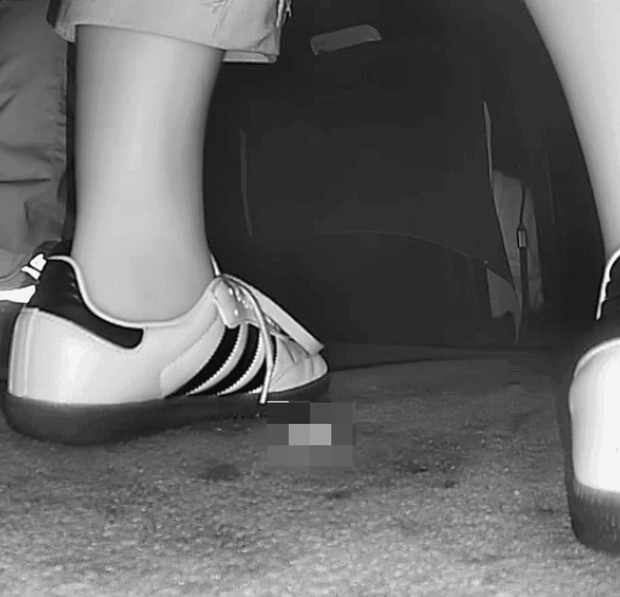 Woman in Adidas Samba sneaker candid crush in movie theater
