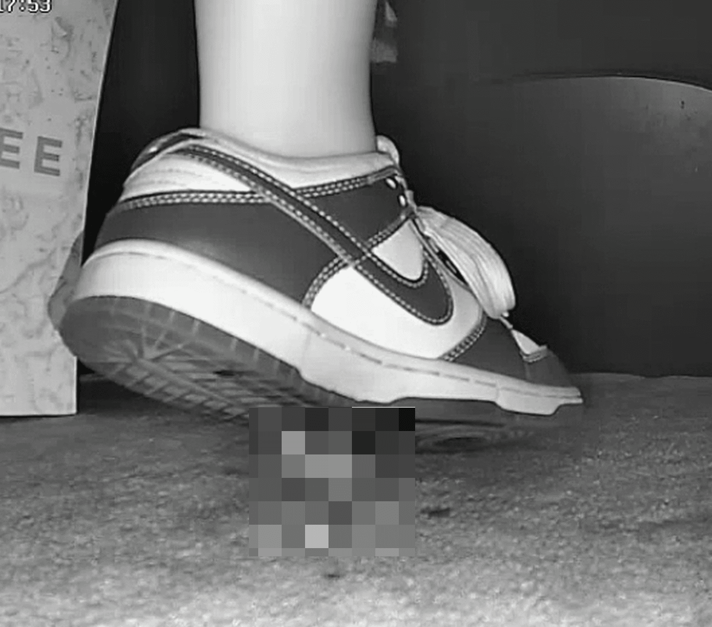 Girl at movie theater candid crush with Nike Dunks sneaker