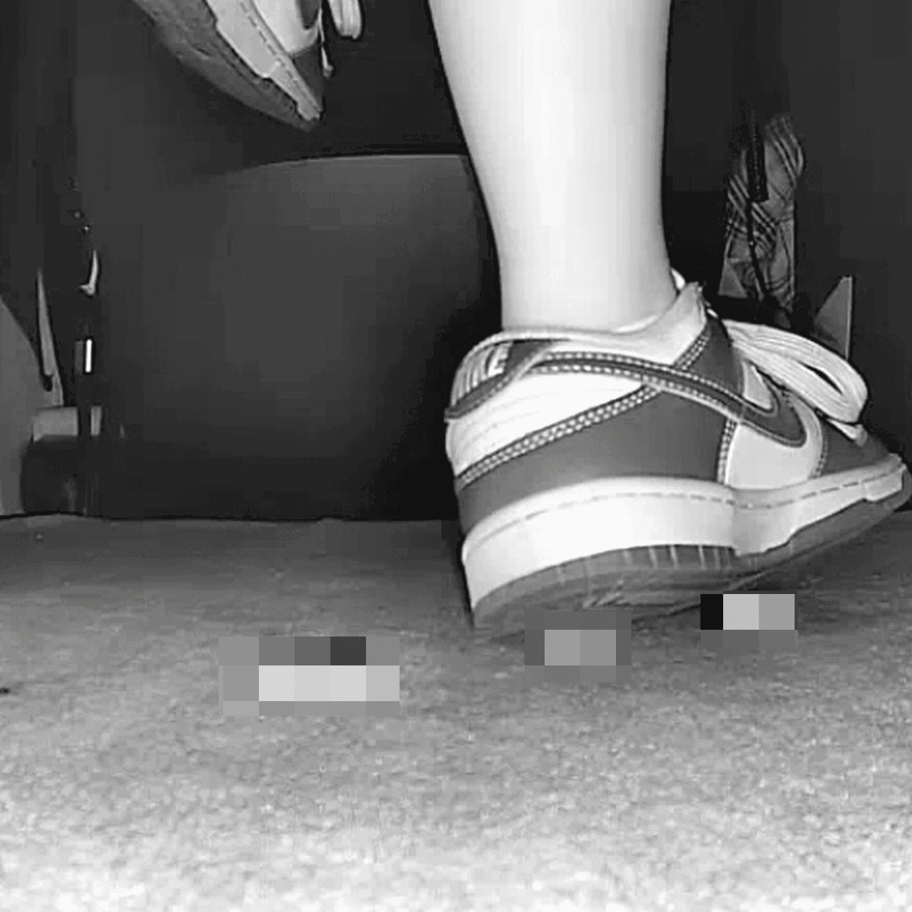 Girl at movie theater candid crush with Nike Dunks sneaker
