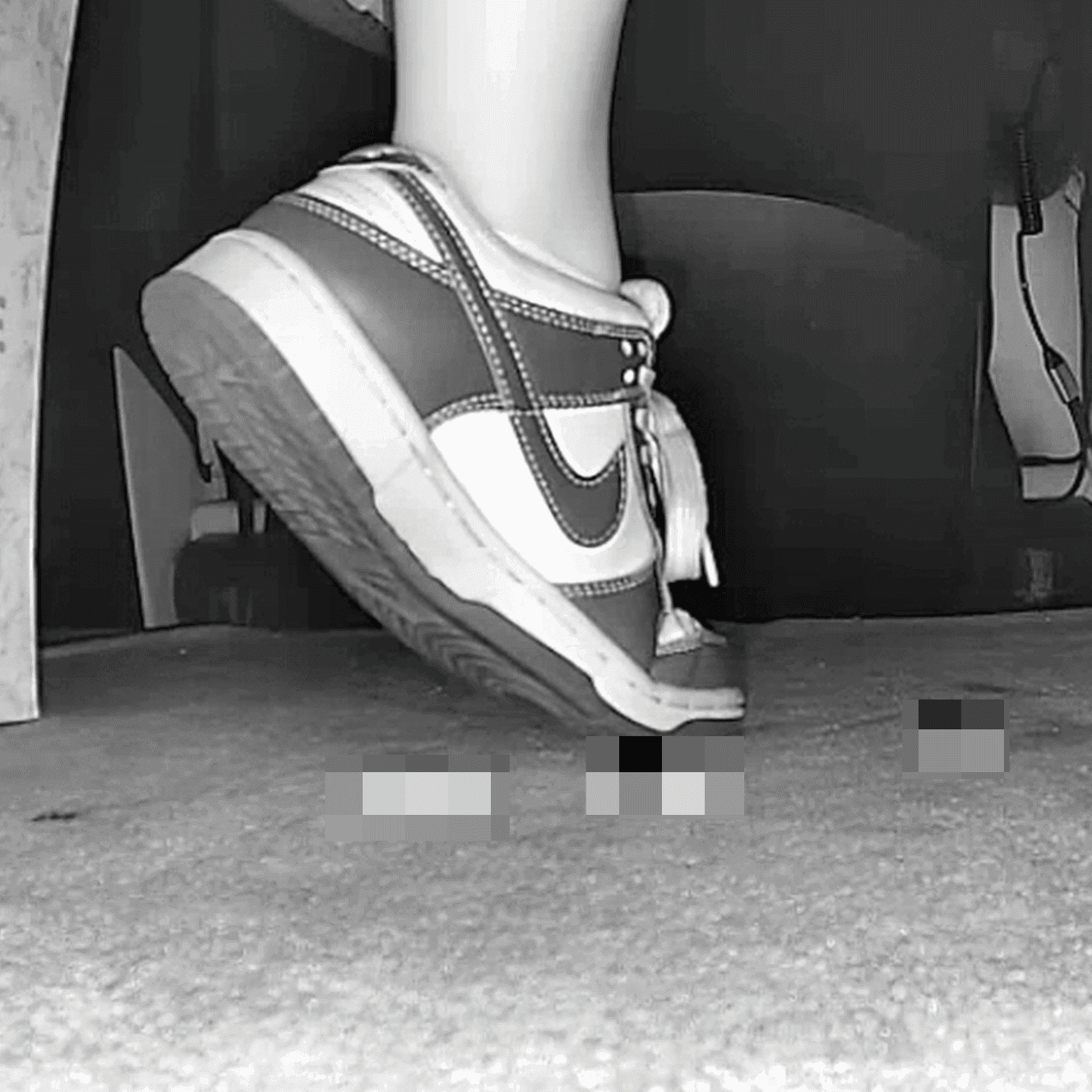 Girl at movie theater candid crush with Nike Dunks sneaker