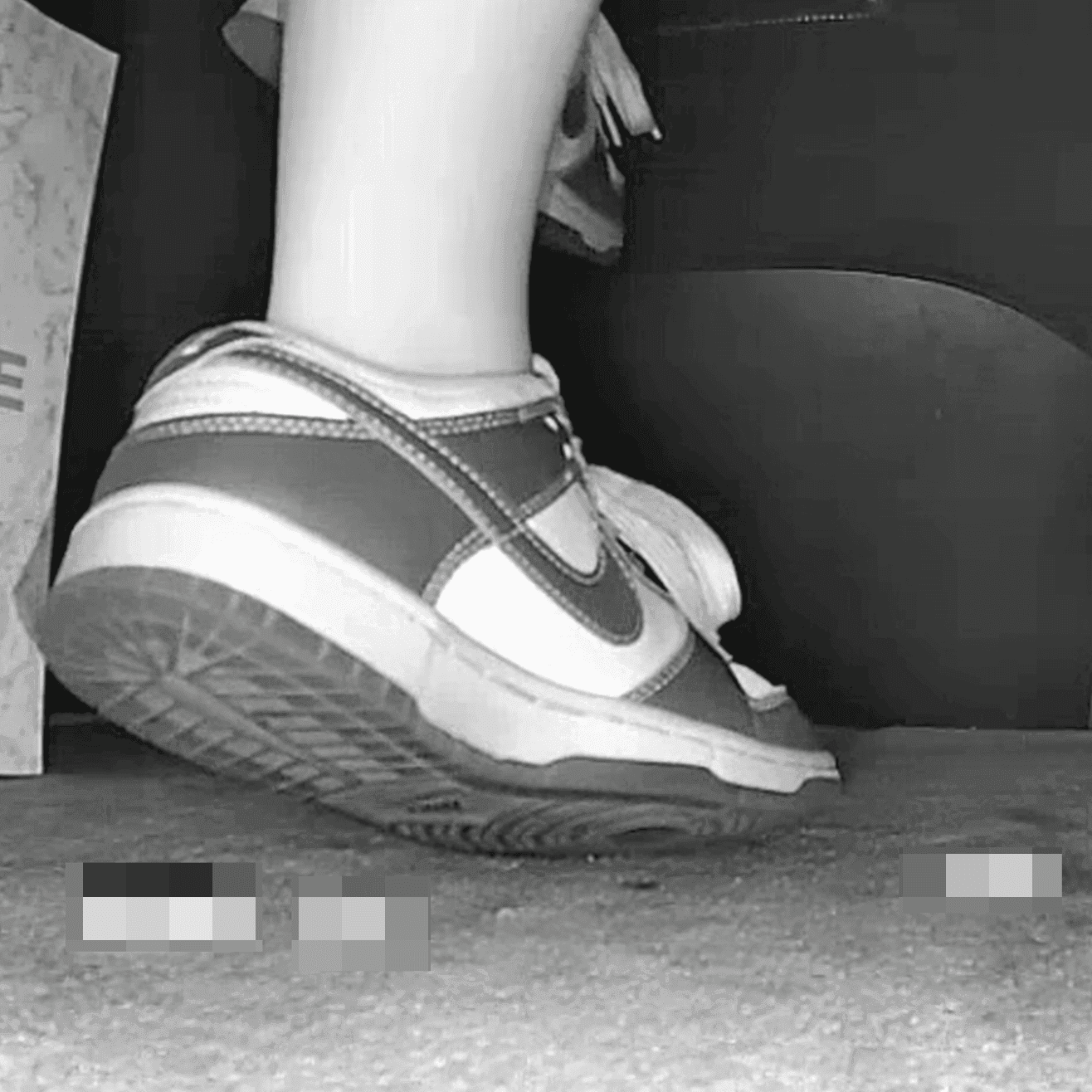 Girl at movie theater candid crush with Nike Dunks sneaker