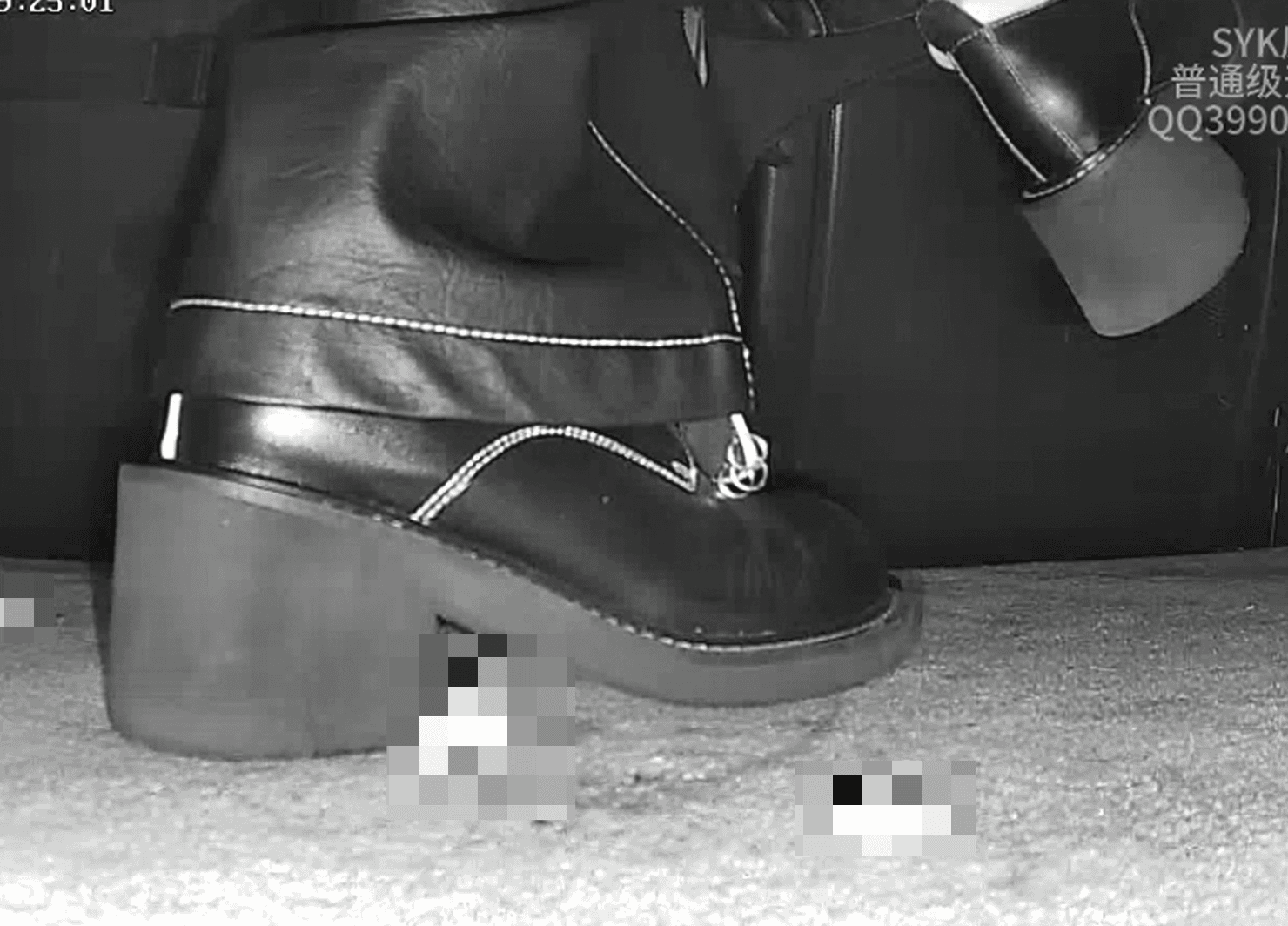 Woman in cinema candid crush with block-heeled boots