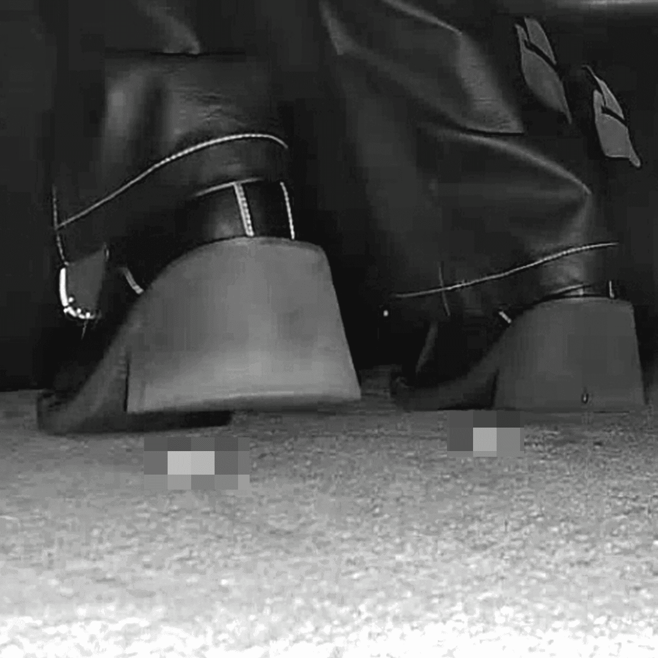 Woman in cinema candid crush with block-heeled boots