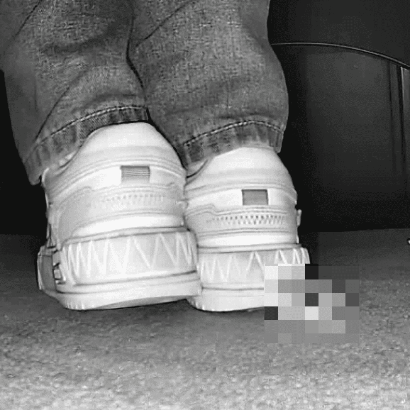 Young woman in cinema candid crush with white sneakers