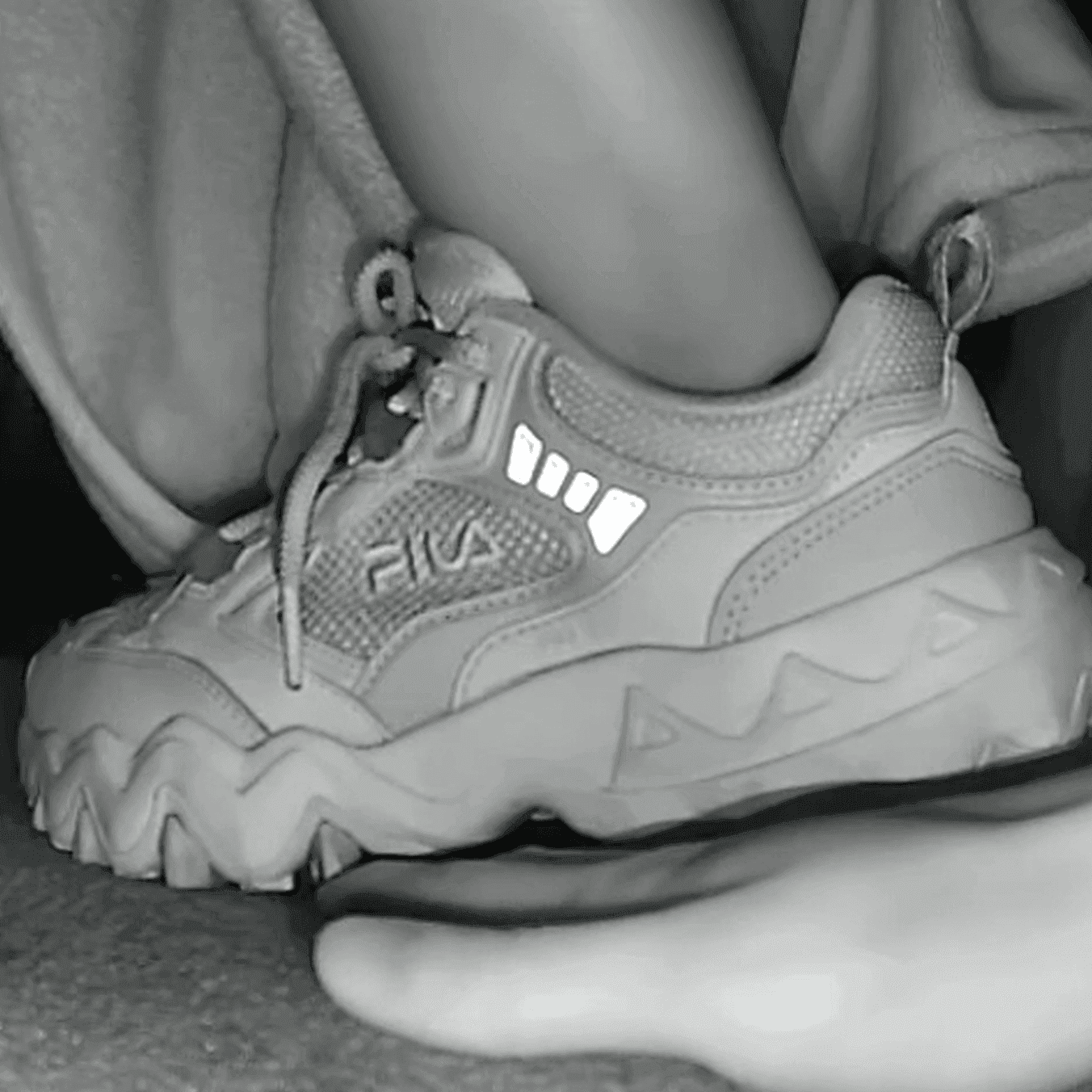 Girl adidas superstar + fila sneaker hand trample in cinema