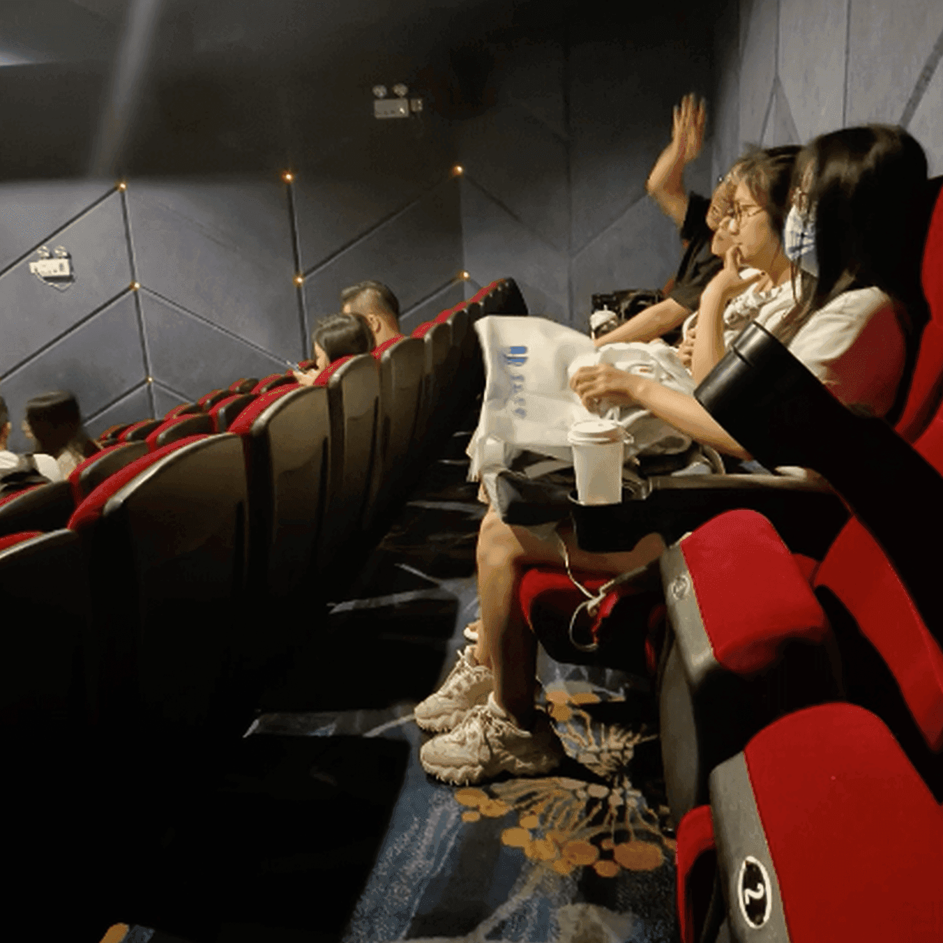Girl adidas superstar + fila sneaker hand trample in cinema