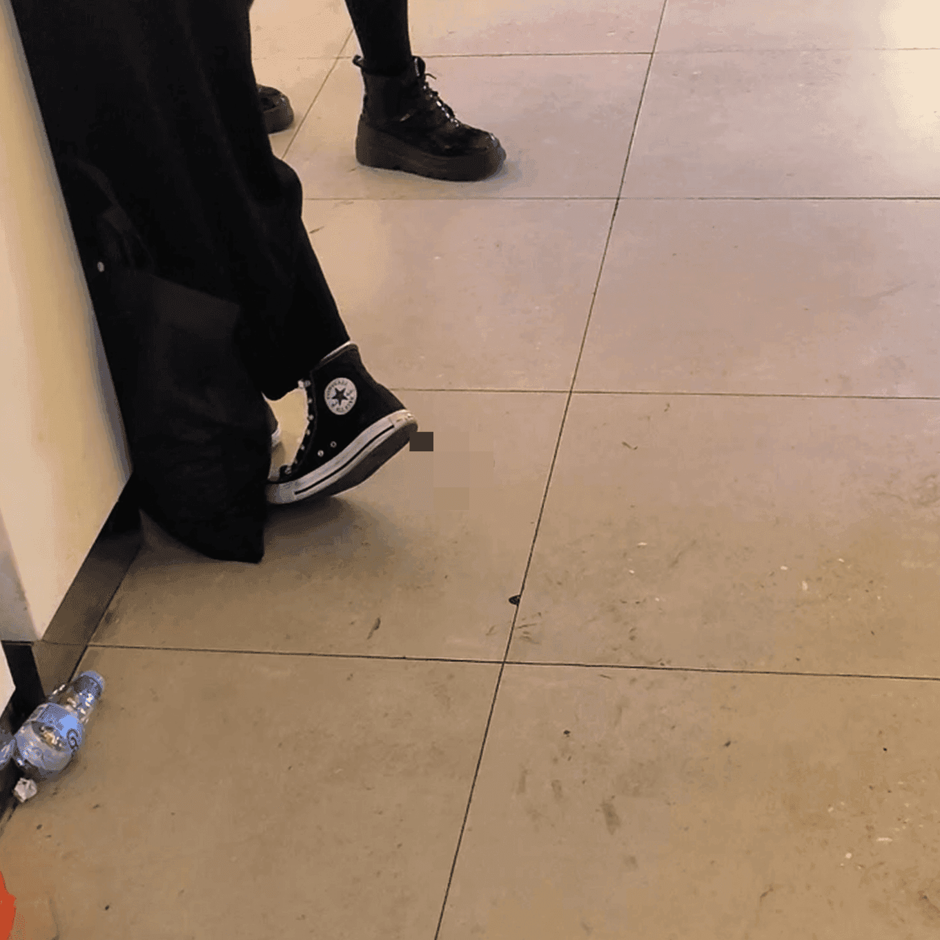 Cosplay girl in anime convention candid crush with black Converse shoes