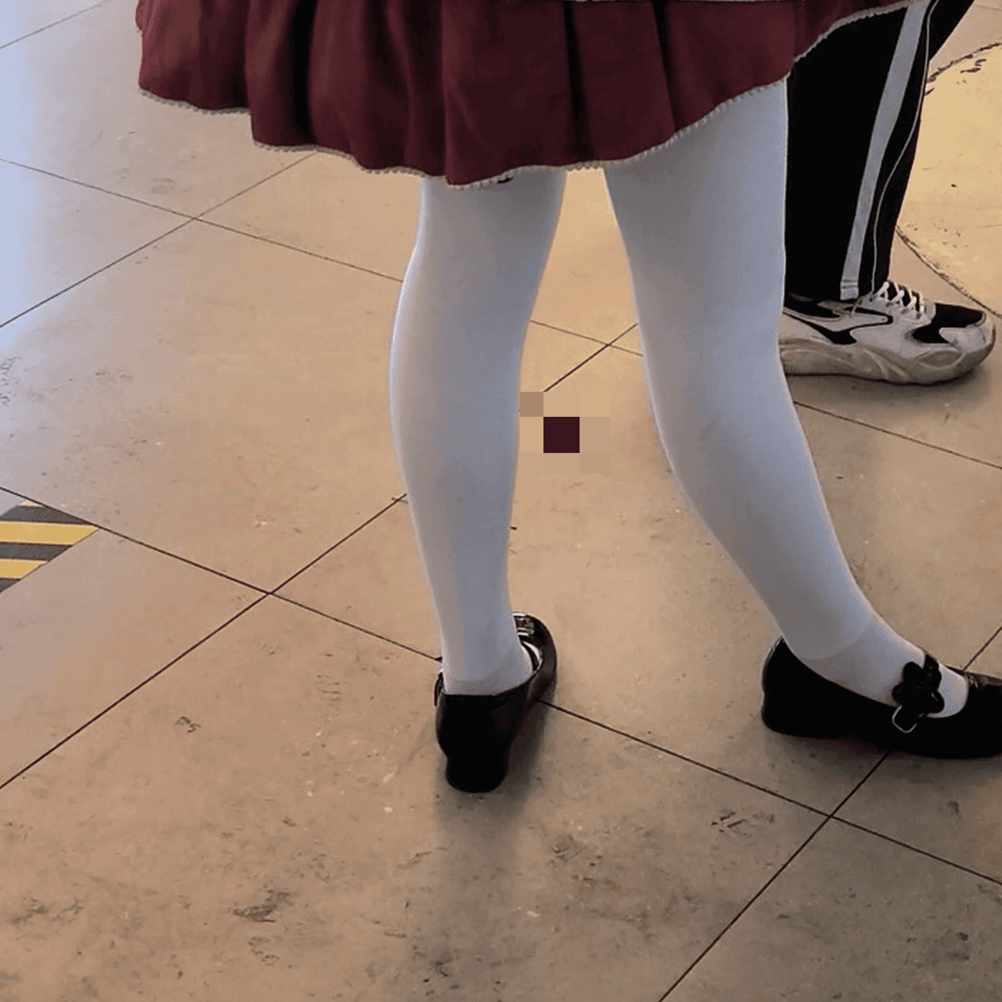 Cosplay girl in anime convention candid crush with black Converse shoes