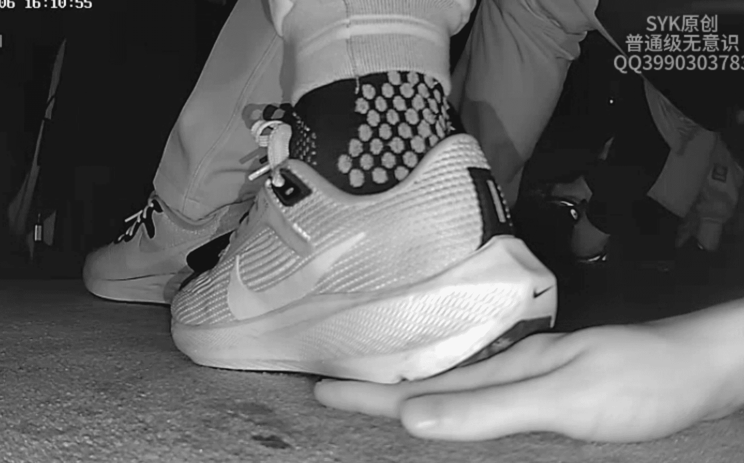 Cinema young girl candid hand trample with Nike running shoes