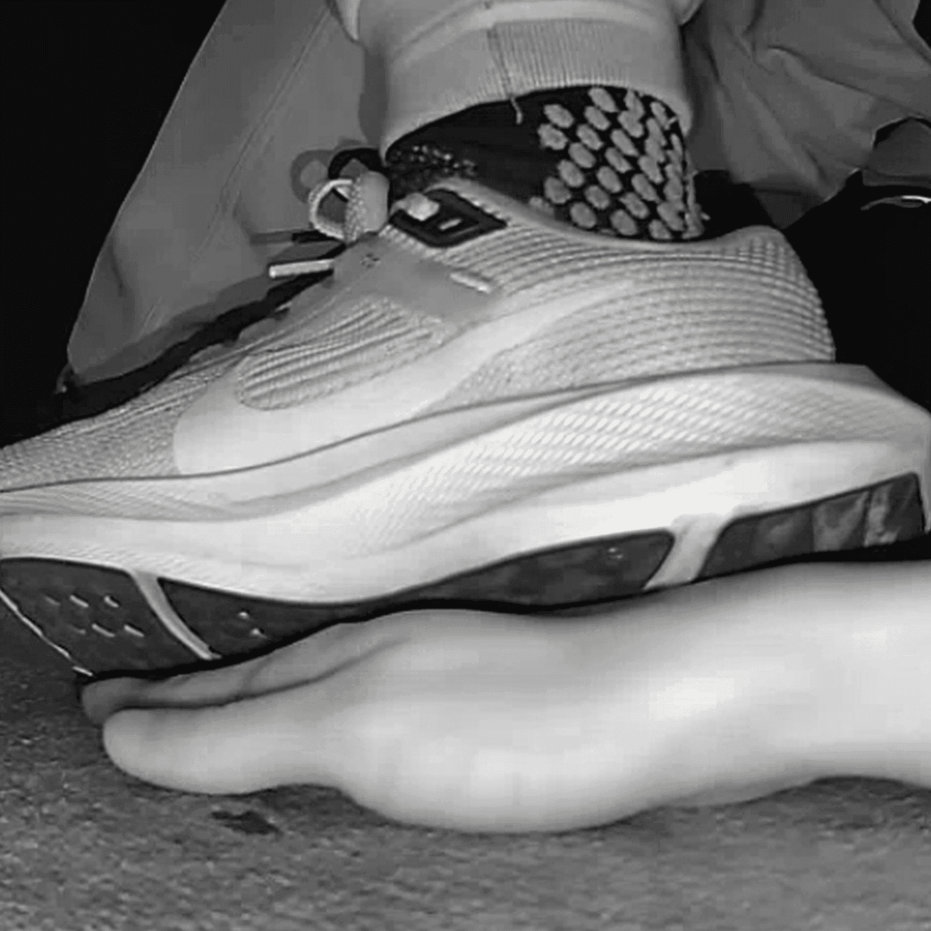 Cinema young girl candid hand trample with Nike running shoes
