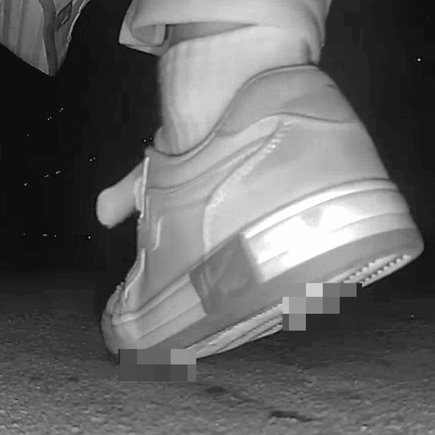 Young woman in cinema candid crush with sneakers and stuck to her sole