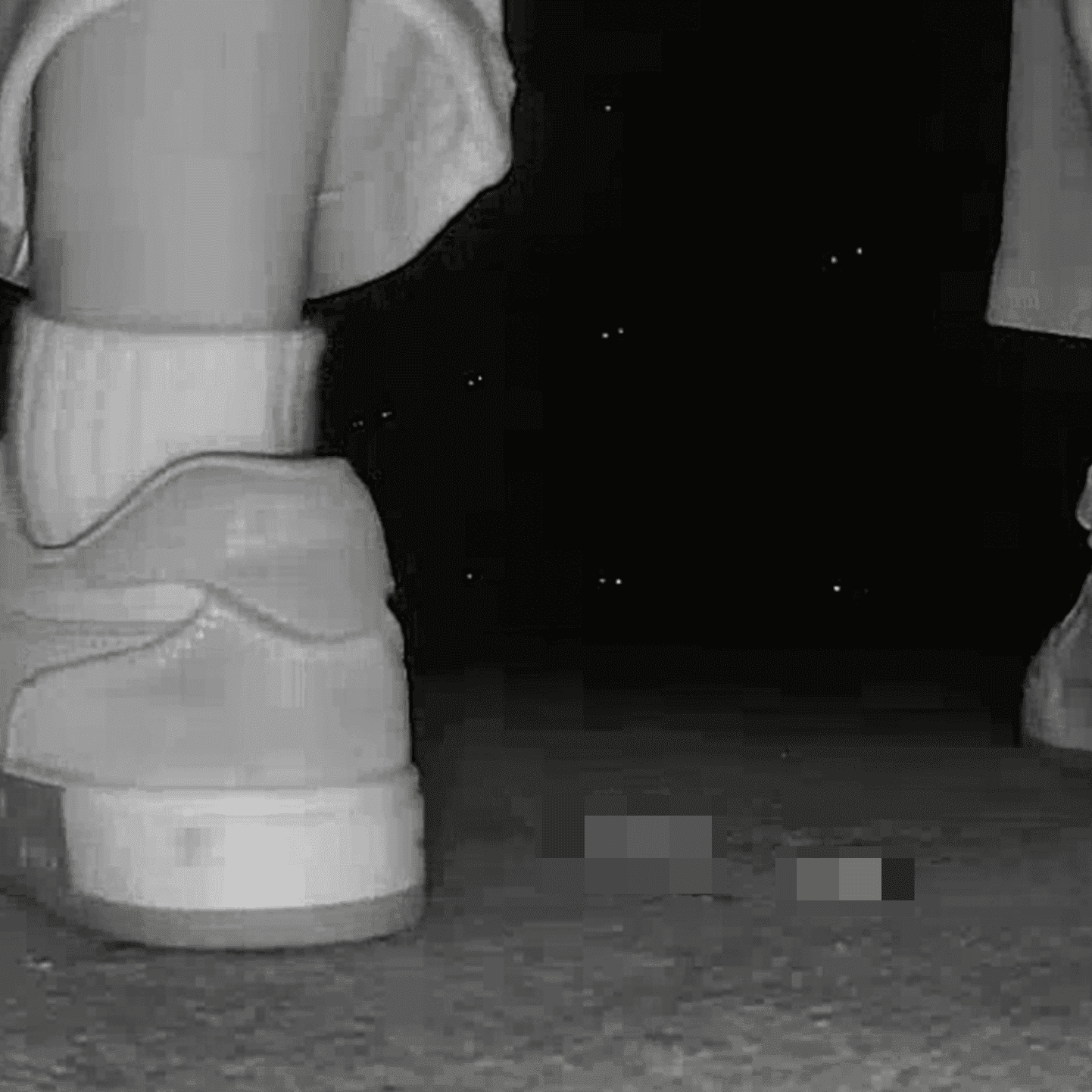 Young woman in cinema candid crush with sneakers and stuck to her sole