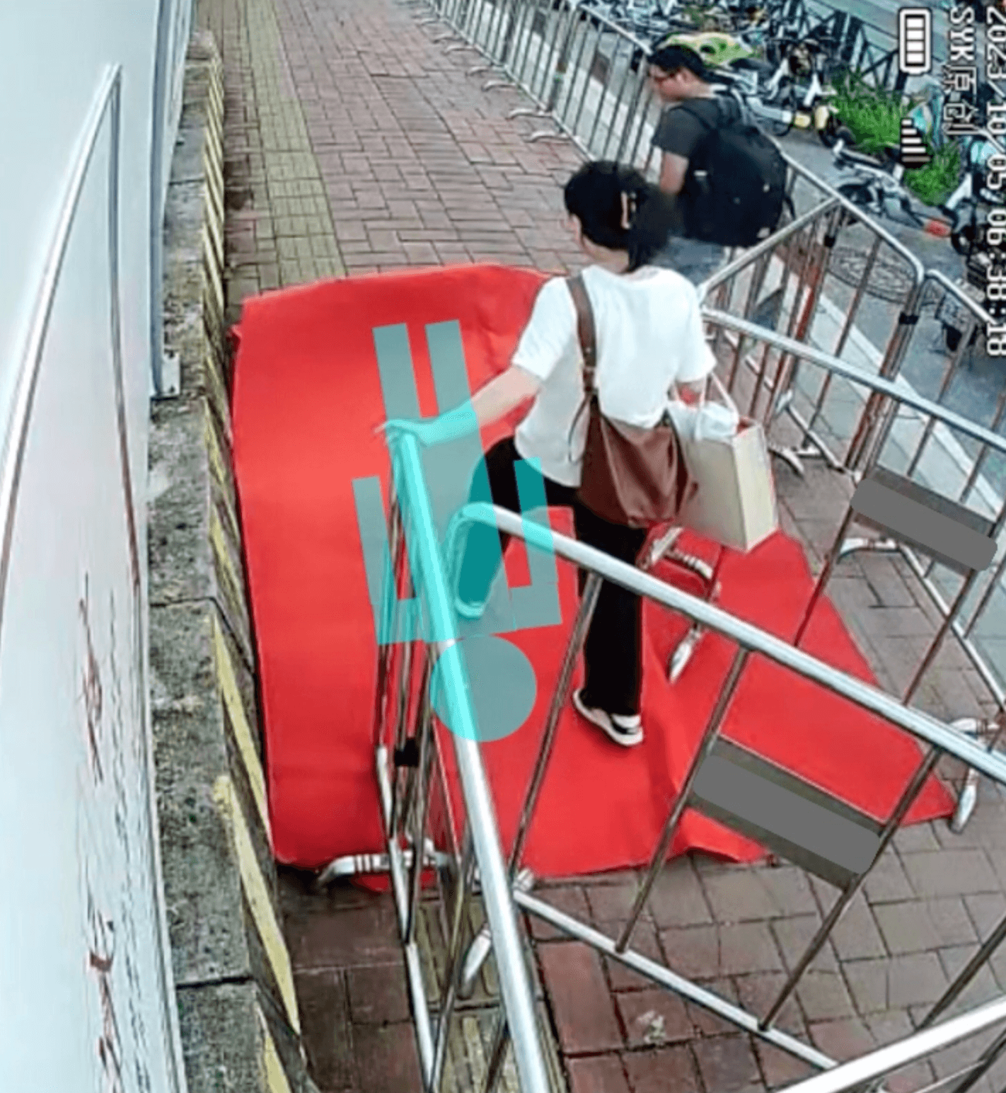 Outdoor human carpet trampled by girls (all girls) on the street