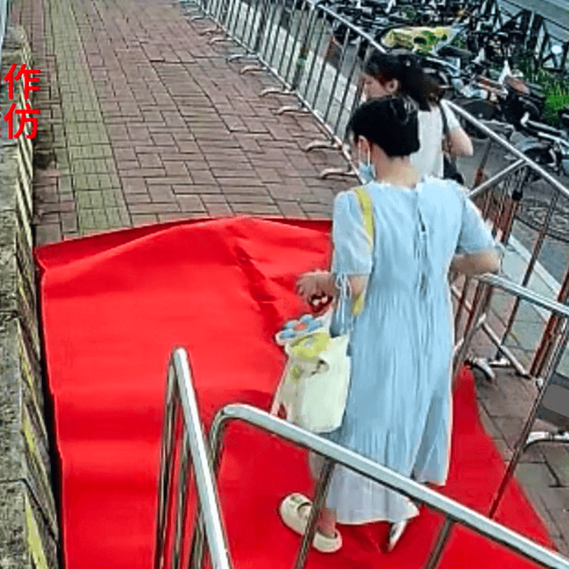 Outdoor human carpet trampled by girls (all girls) on the street