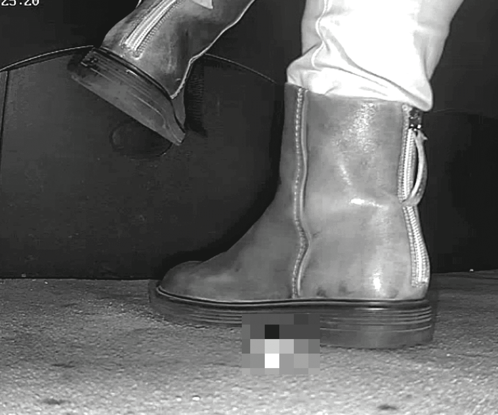 Woman in ankle boots candid crush in the cinema