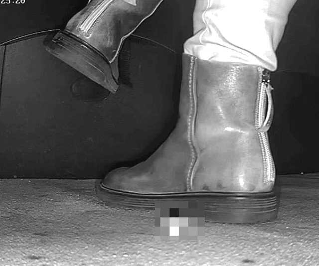 Woman in ankle boots candid crush in the cinema