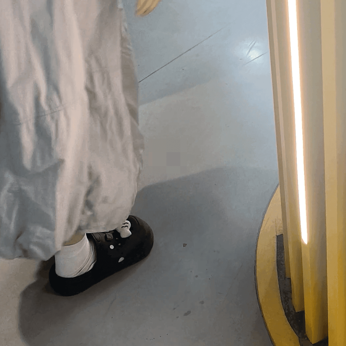 Woman passing by the clothing store entrance and the women's restroom doorway candid crush