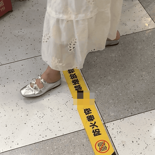 Woman passing by the clothing store entrance and the women's restroom doorway candid crush