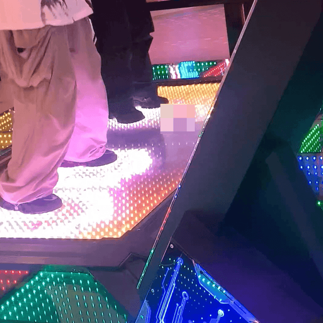 Two ladies in black sneakers candid crush on the dance machine