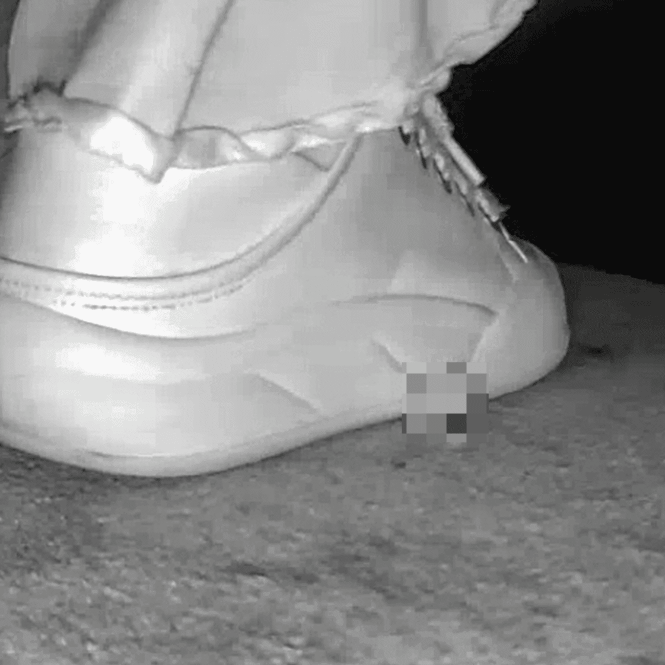 Woman in skirt and white sneakers candid crush in the cinema