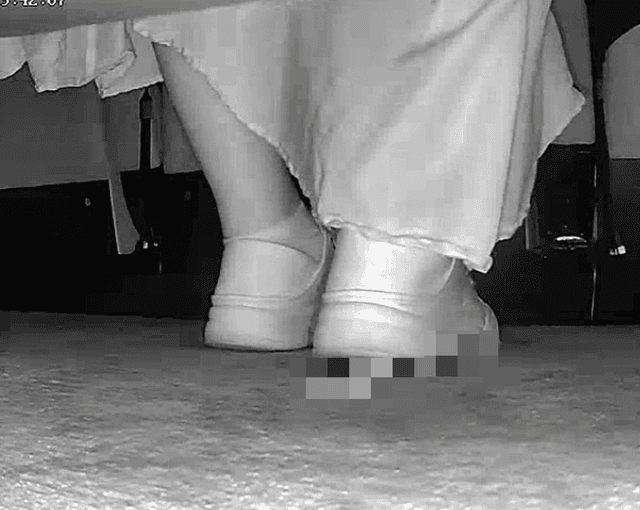 Woman in skirt and white sneakers candid crush in the cinema