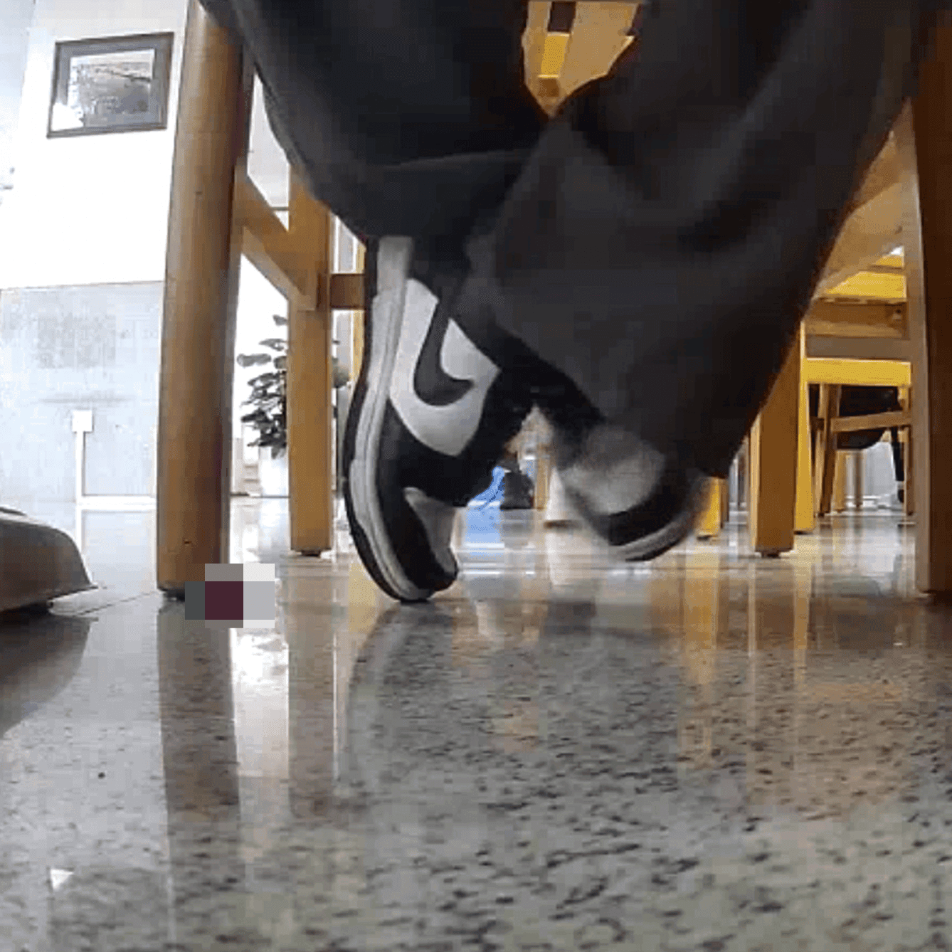 Woman in white socks and sneakers candid crush in library