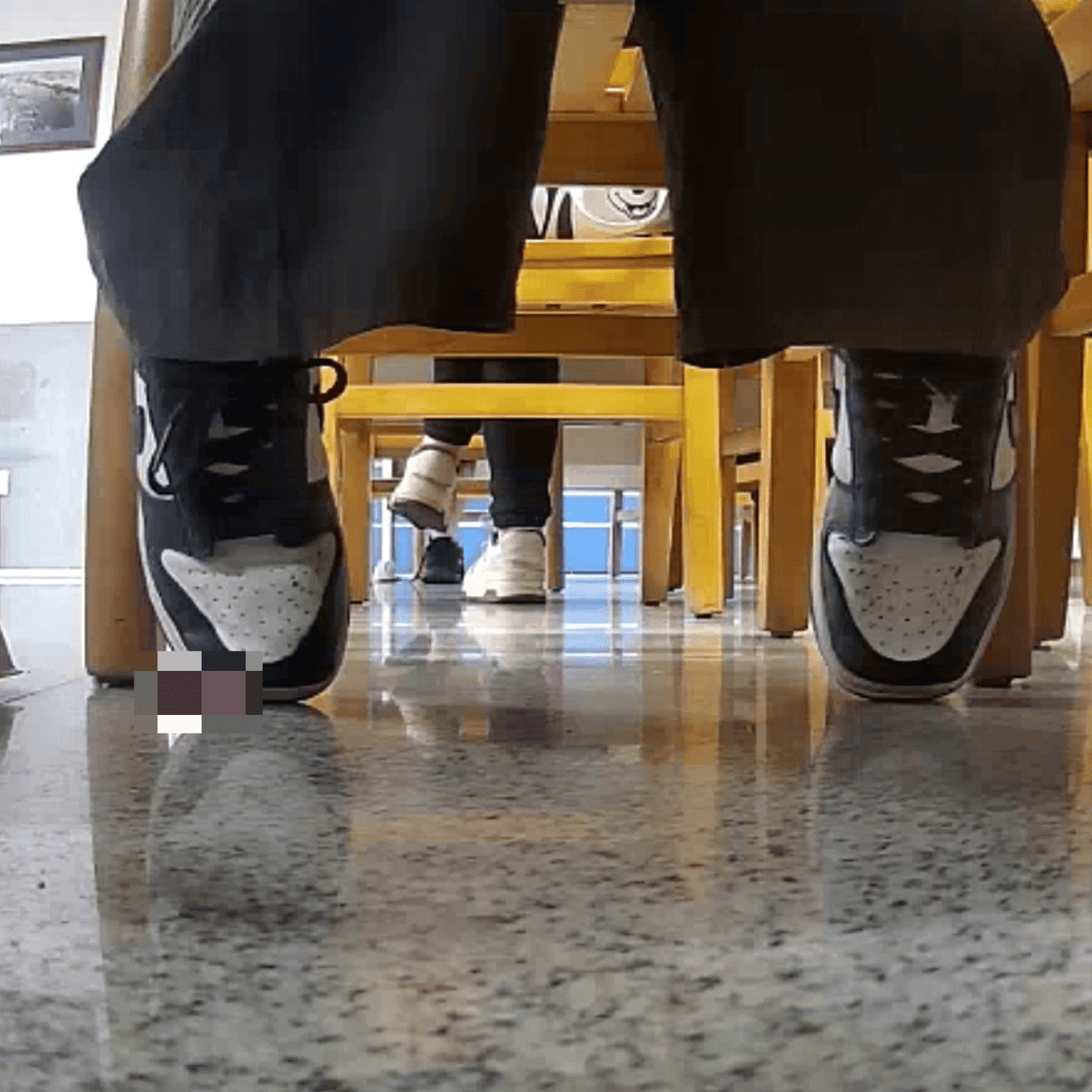 Woman in white socks and sneakers candid crush in library