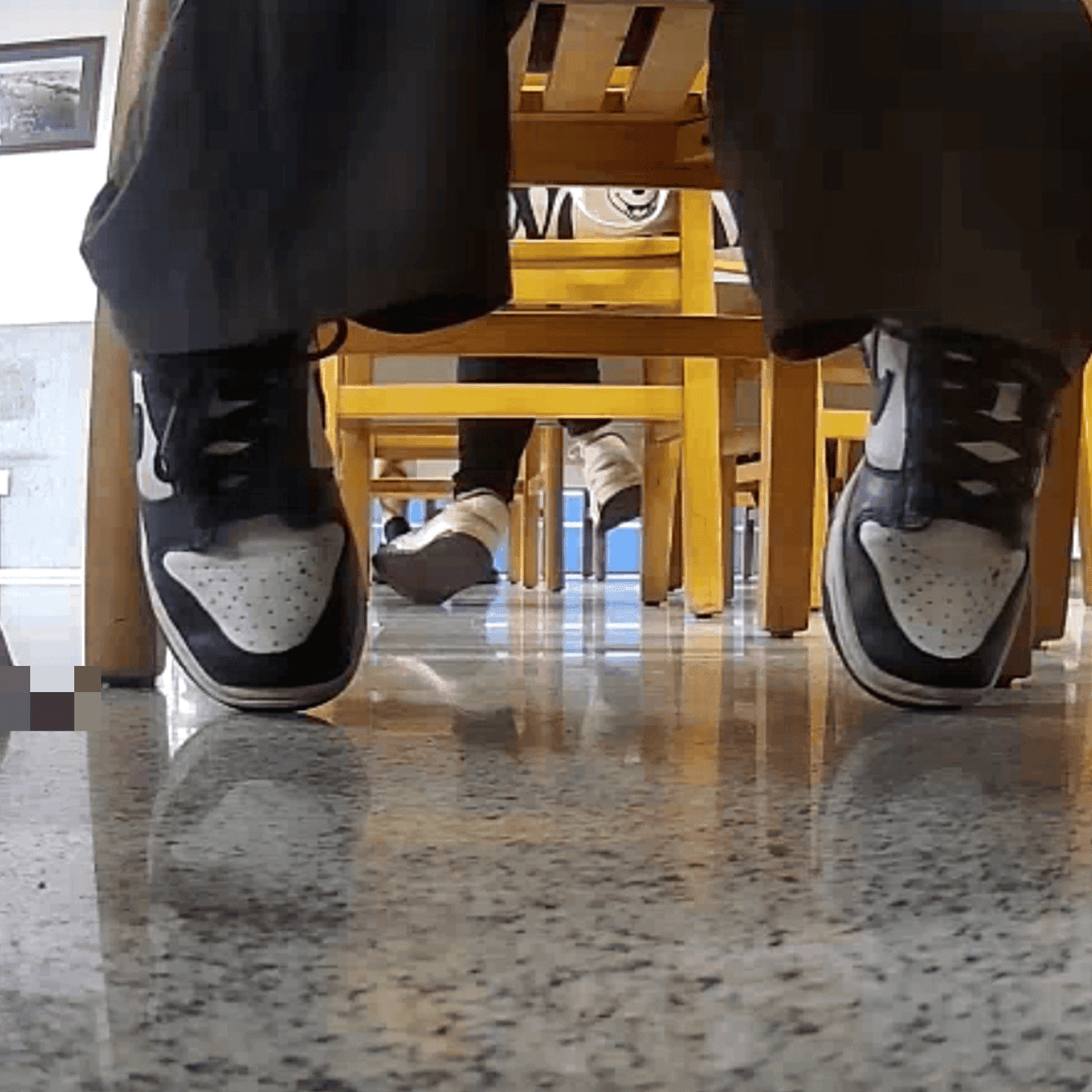 Woman in white socks and sneakers candid crush in library